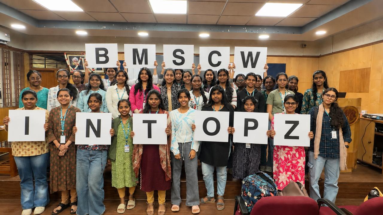 BMS College for Women students holding BMSCW and INTOPZ letters